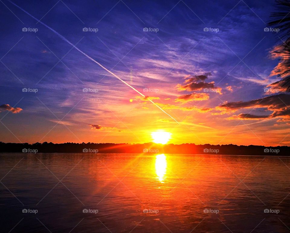 The color of twilight and sunset. The dramatic hurried rush of yellow and orange collapse as the sun sank below the gorgeous, colorful, cloudy skyline