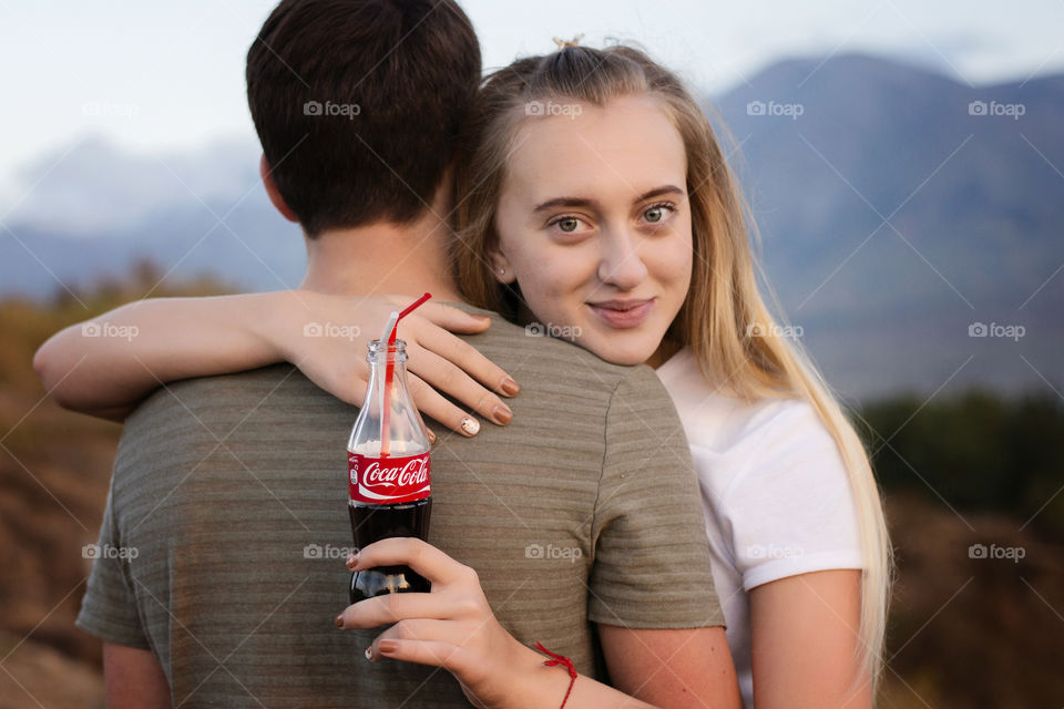 Young couple hugging each other