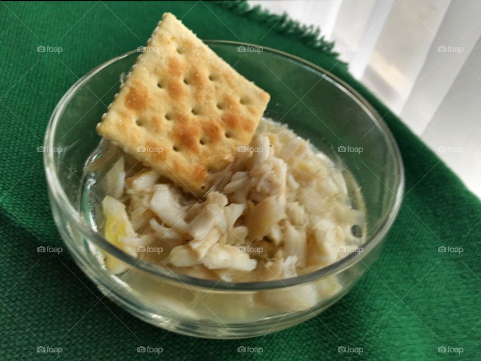 West Indies salad with crab meat in a saltine cracker