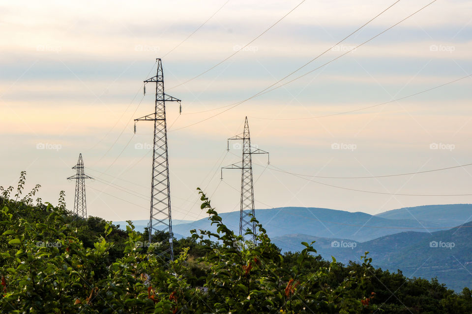 Power lines over countryside