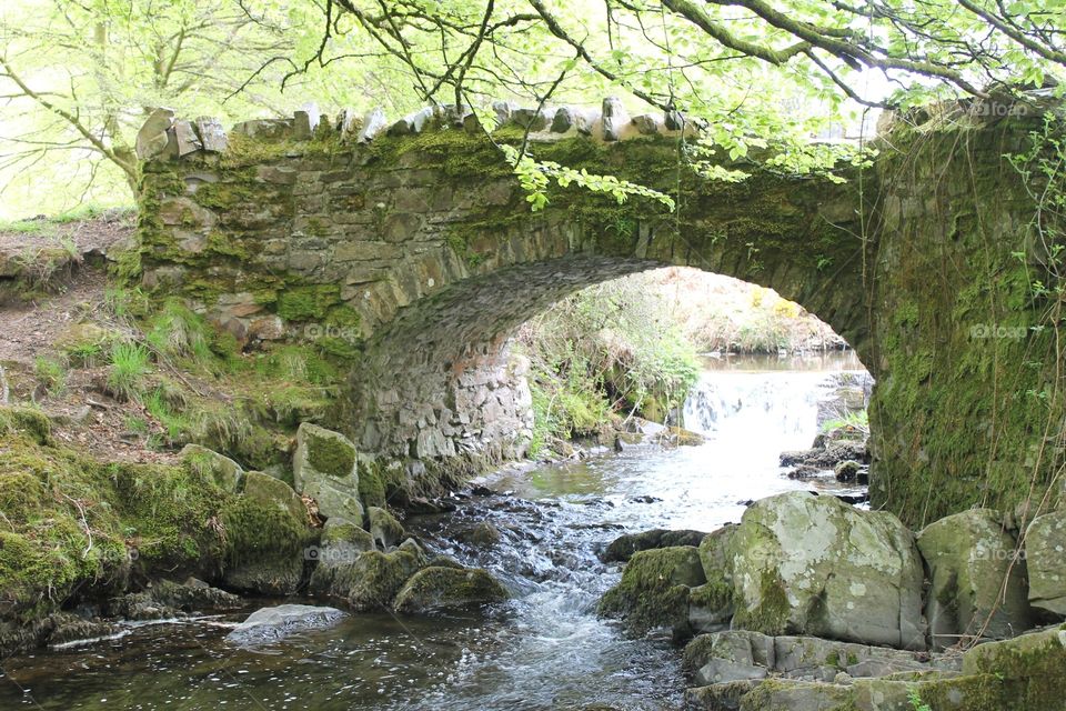 Old stone bridge over stream English