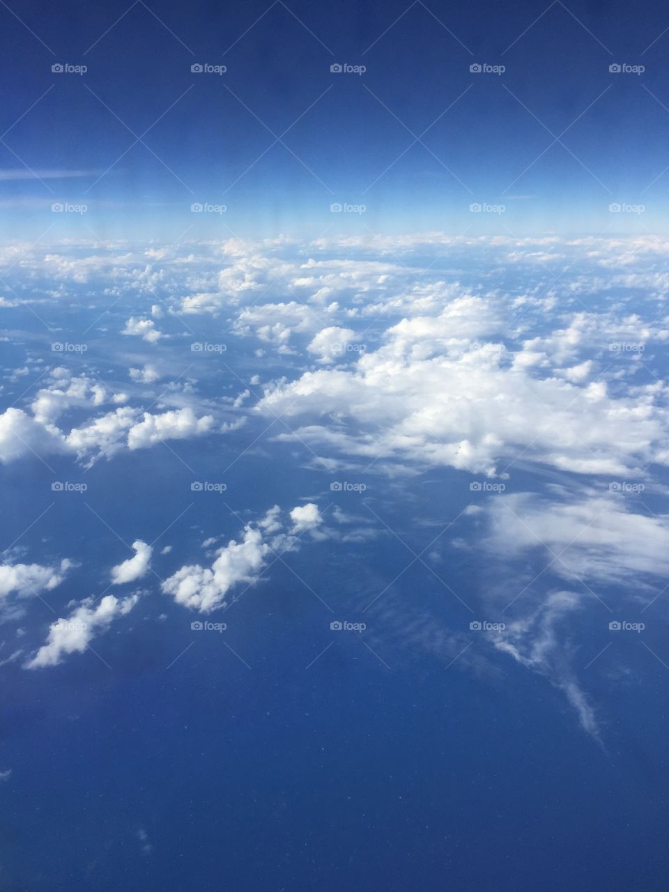 Small white clouds from above