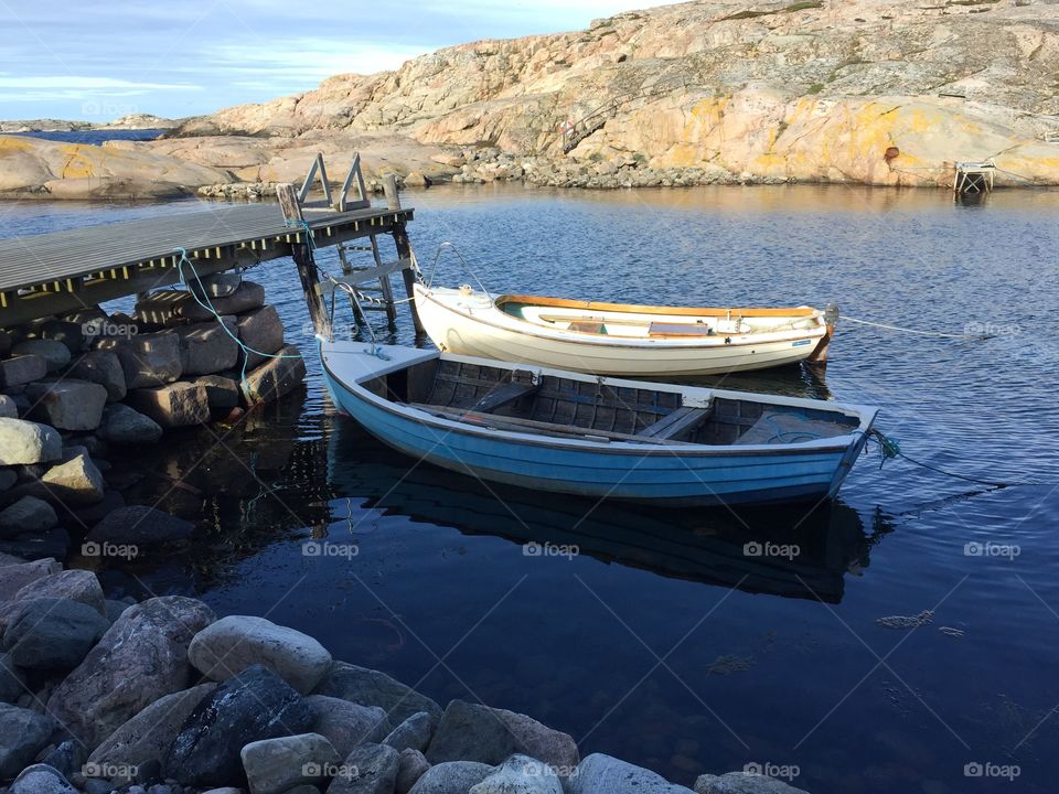 Boats moored at lake