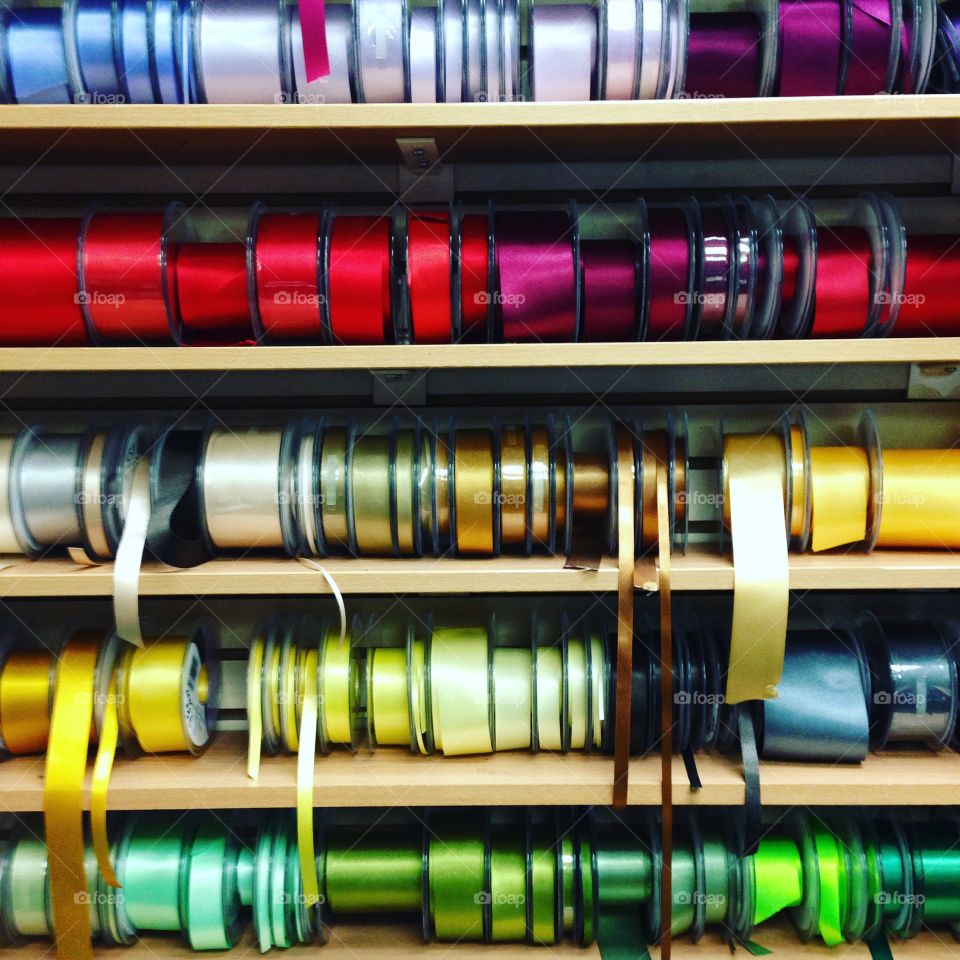 Rows ribbon reels shelves shop
