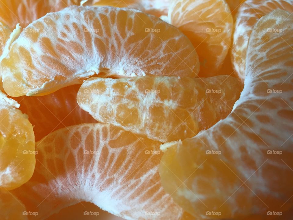 Freshly peeled oranges 