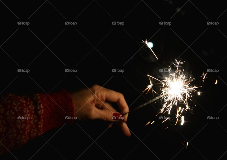 night view bengal light in the hand Christmas holiday