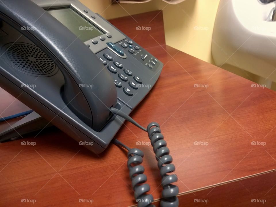 Phone on a desk.