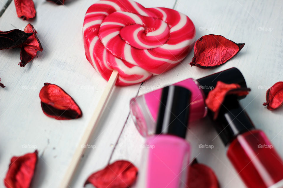 Beauty, health, spa and personal care: nail polish, flowers, rose petals, sweet