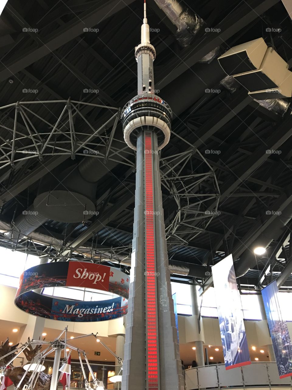 View above on the CN Tower in Toronto Canada. Large CN Tower figure in store. 