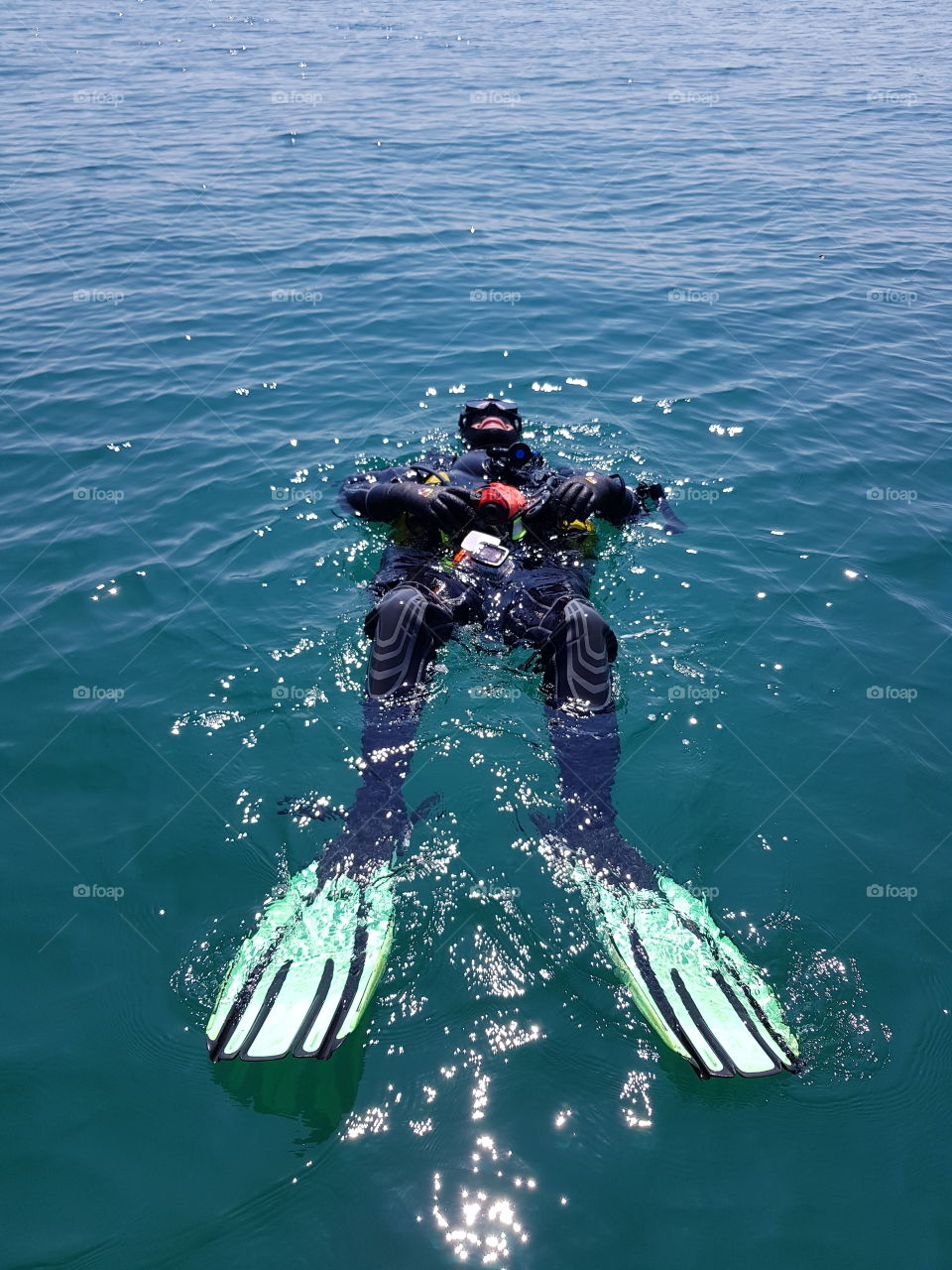 scuba diver relaxing after a dive