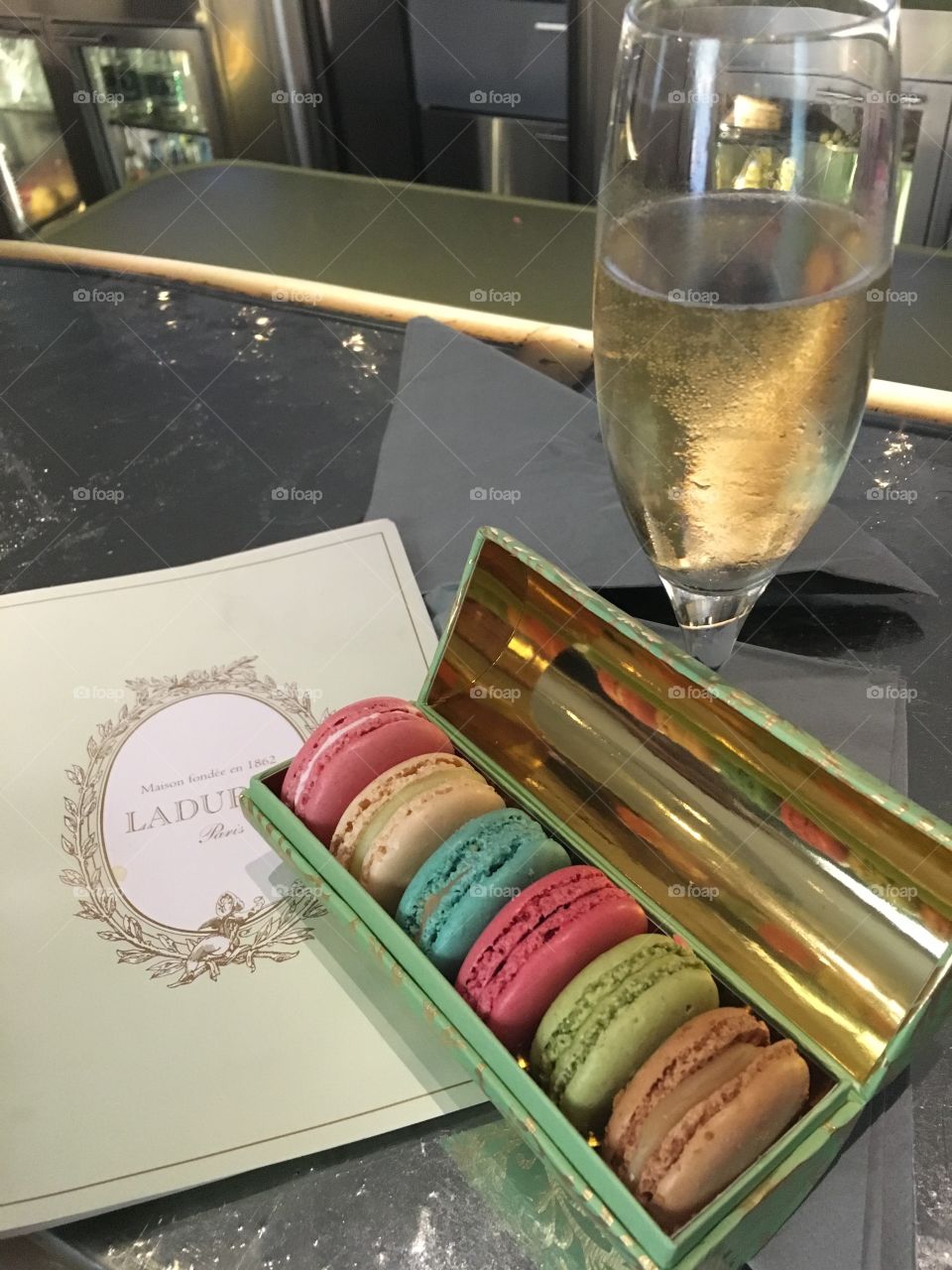 Laduree macaroons with veuve clicquot champagne treats - Laduree Champs-Elysees, Paris