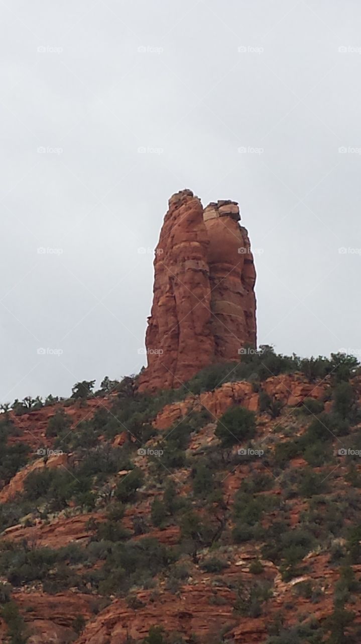 Stone Figures. This formation on top of a hill in Sedona reminded me of people,  perhaps Native Americans.  