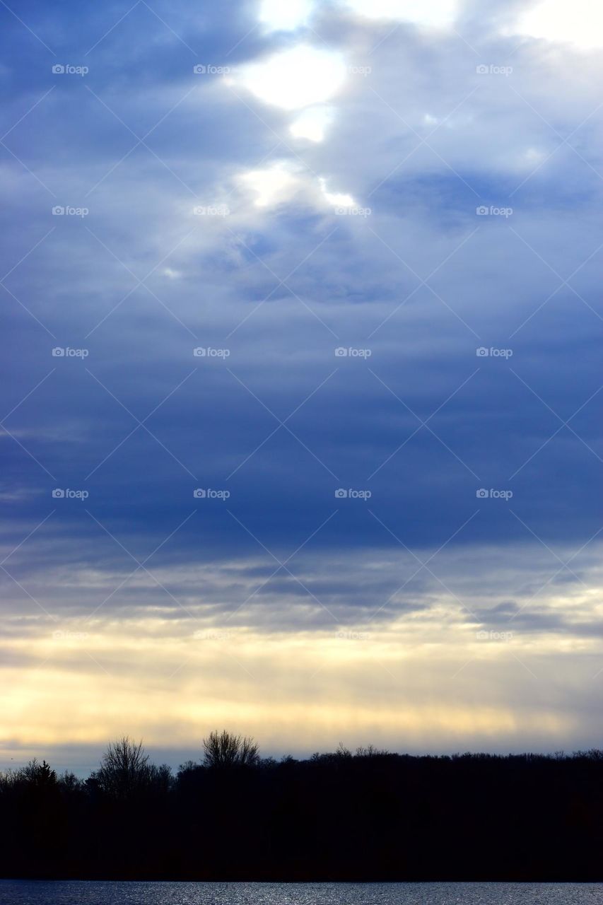 A beautiful sky overlooks the cold lake