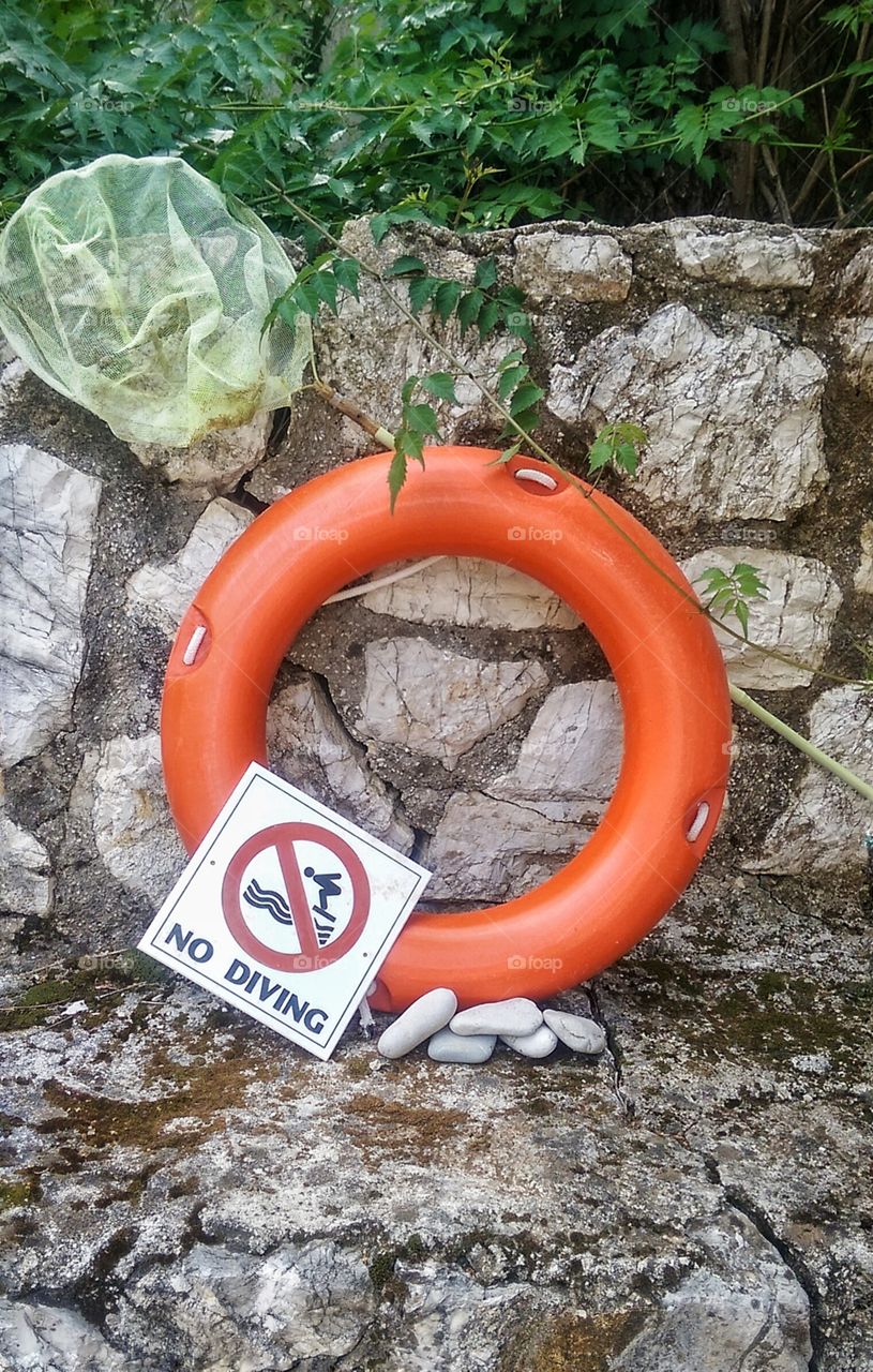 swimming safety. around our pool in Nasaki Greece 