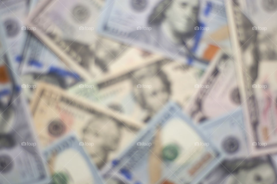 dollar background. background made of blurred dollars