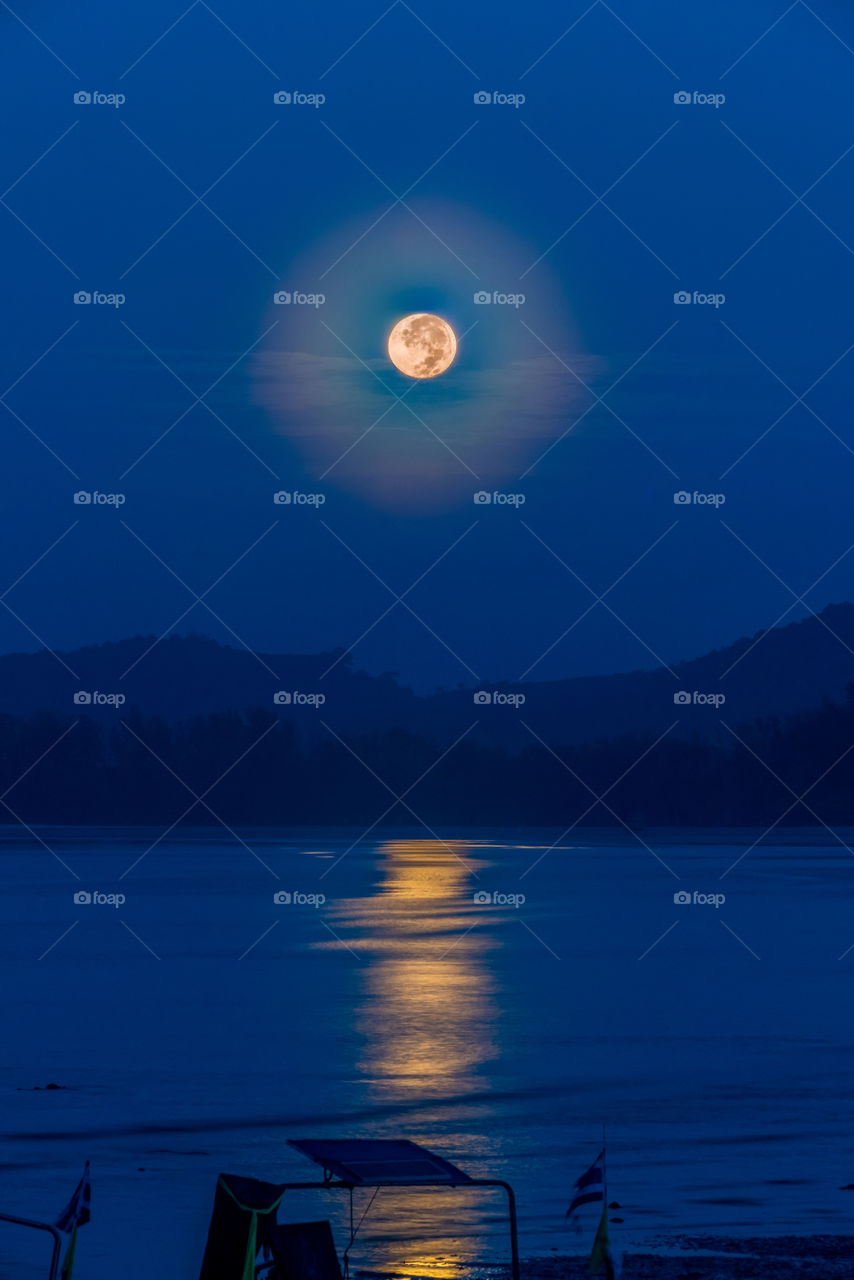 Full moon and reflection