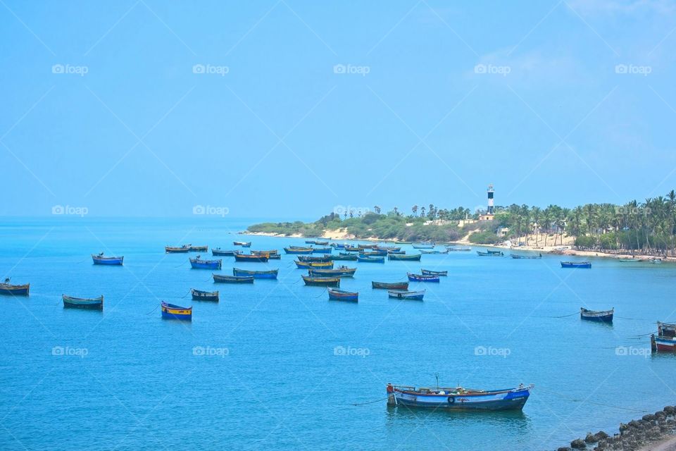 #seashore #boat #lighthouse #rameshwaram #dhanushkodi #greenandblue #naturalbeauty #india #loveofnature