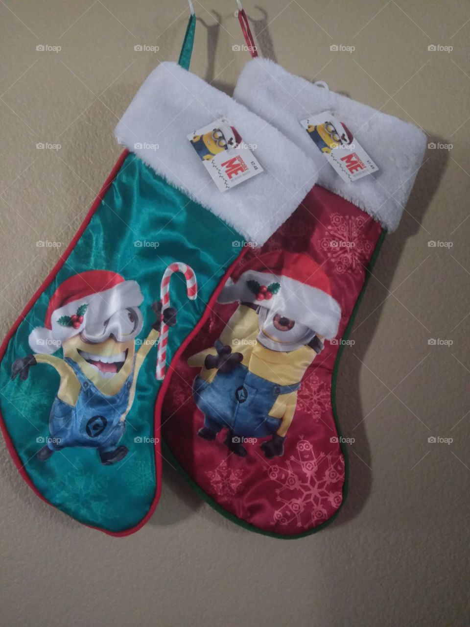 Minion stockings hung for boys for Christmas.