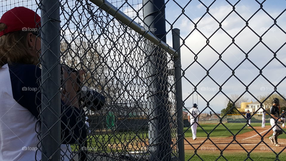 Photographer at baseball game