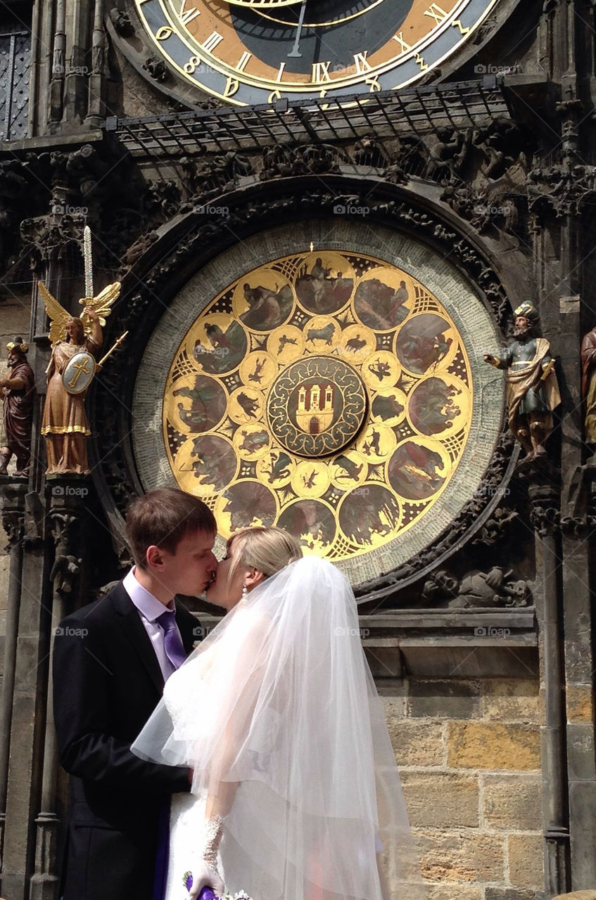 A couple shooting wedding photo at old town square, Prague