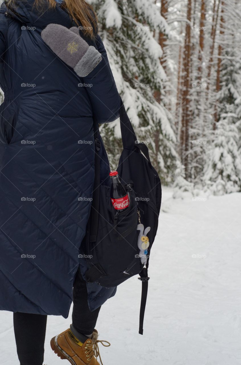 Coca-Cola bottle in the black package.