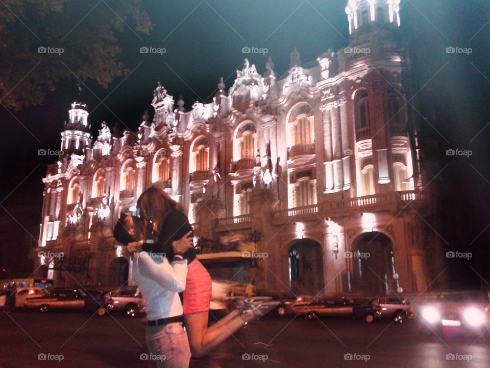 Couple kissing on street