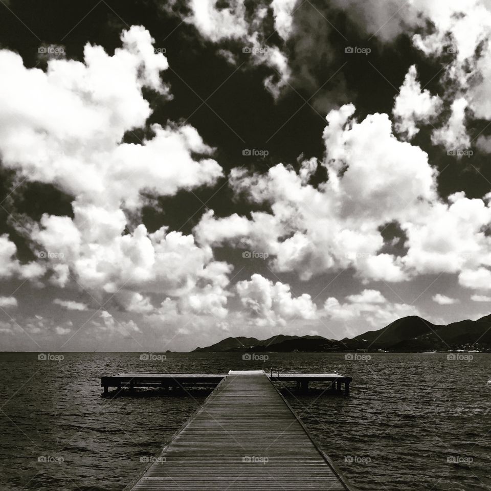 Monochrome Pier Leading Out To The Ocean, Clouds Fill The Sky On The Open Ocean, Caribbean Beauty, Oceanside Scene, Saint Martin Island Life 