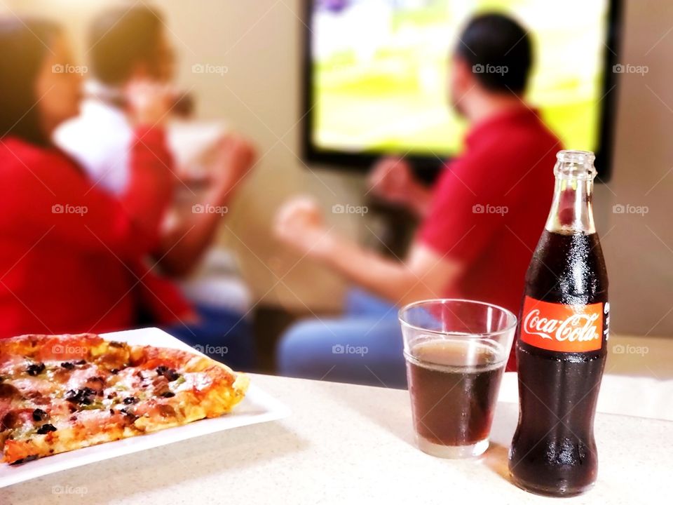 Enjoying the game with Coca Cola! 