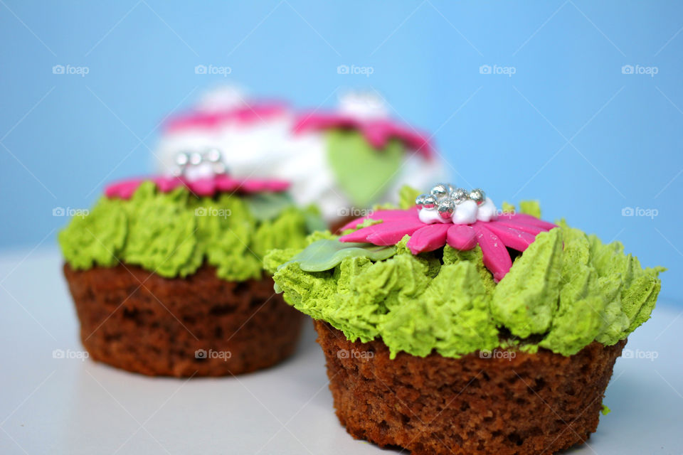 Crazy cupcakes, muffins, a cupcake, a bright cupcake, a cupcake with cream, Cake, sweetness, dessert, cream, bright cake, sugar, delicious cake, flower, cake with flower, color, Fruitcake