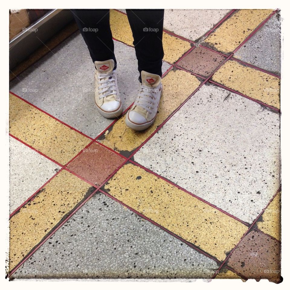 Sneakers on a marble floor