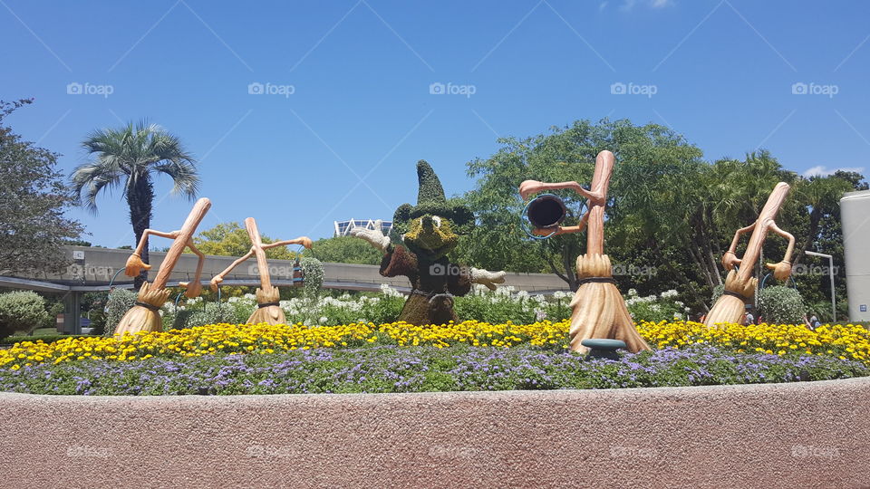 Sorcerer Mickey brings his companions to life at the EPCOT Flower & Garden Festival at the Walt Disney World Resort in Orlando, Florida.