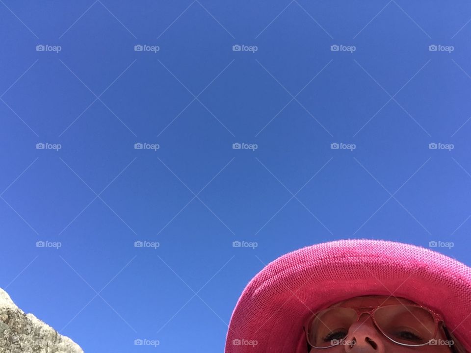 Pink hat, blue sky