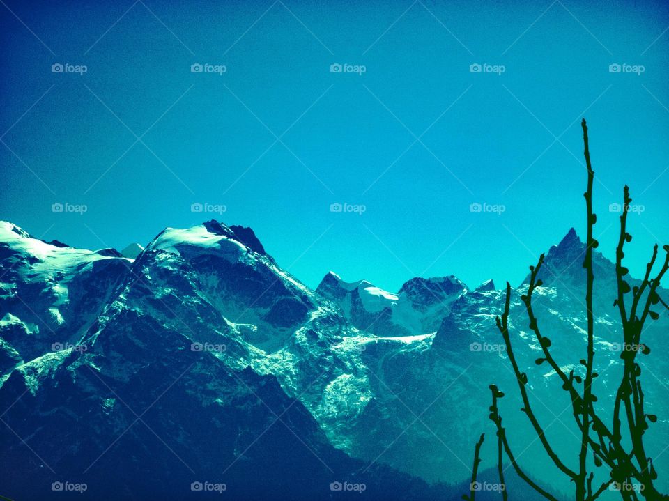 mountain peaks shining in winter