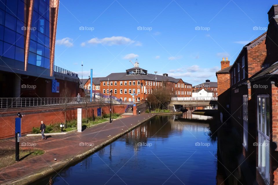 Enjoying a nice walk along the river channel in England