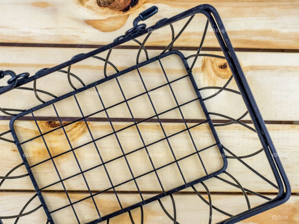 Empty basket on wood