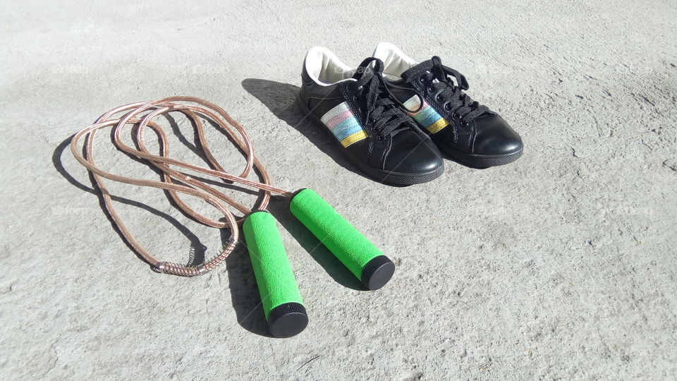 jump rope and sport shoes
