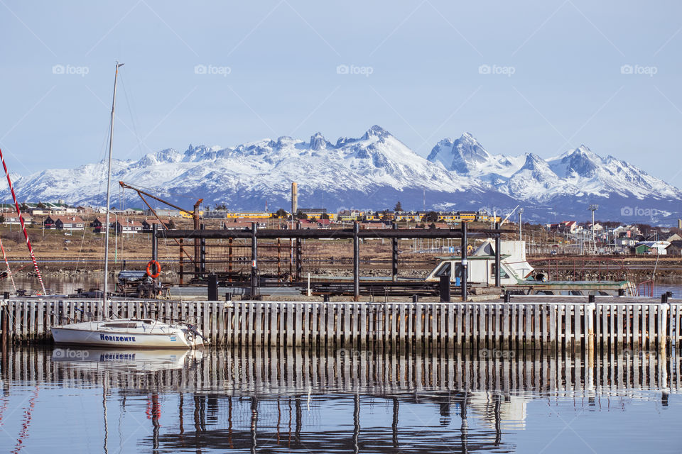 port with snowy mountains