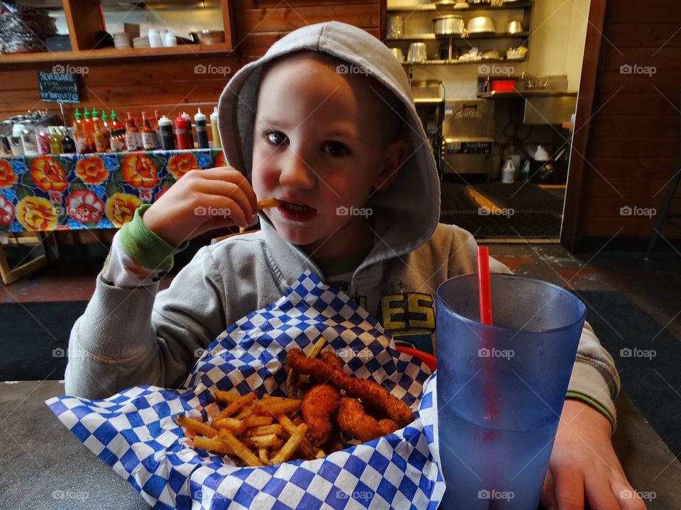 Child Eating Lunch
