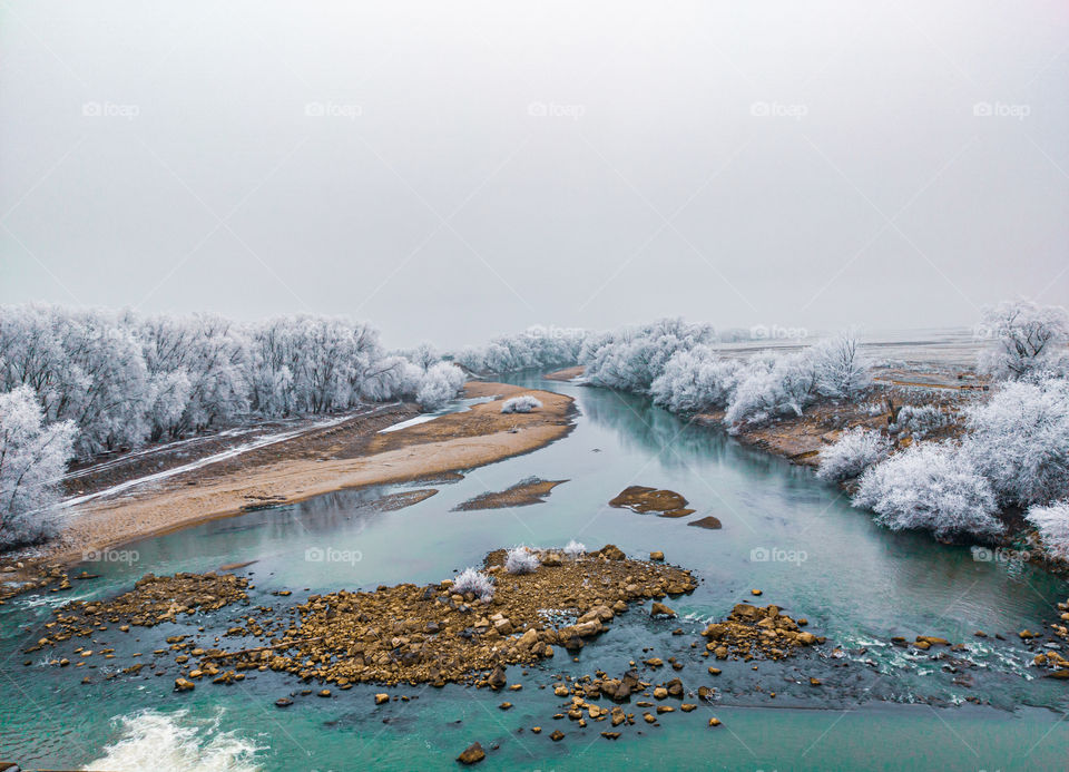 Drone shoot above a cold river