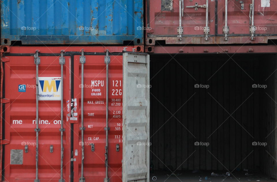 Arranged container at the harbour. Colour shape interest for the eyes. They're empty to the next of shipment.