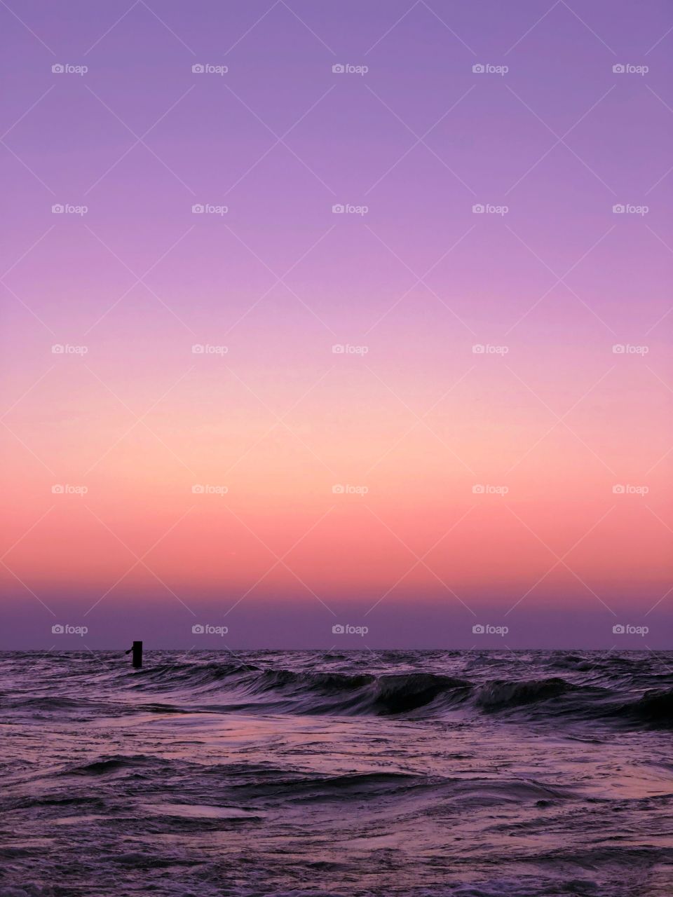 Beautifull purple night time sky and sea
