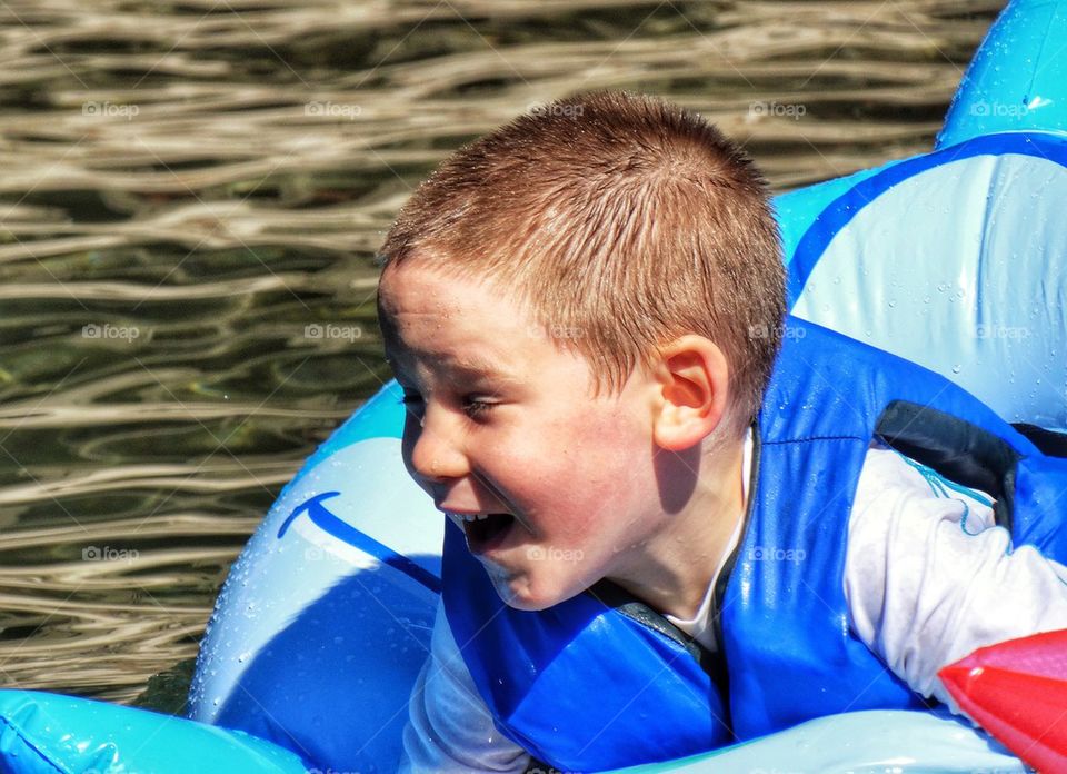 Joyful Swimming Child
