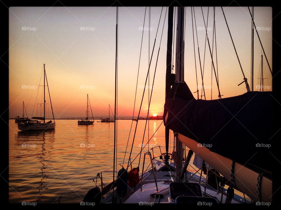 watching the sunset on a sail boat