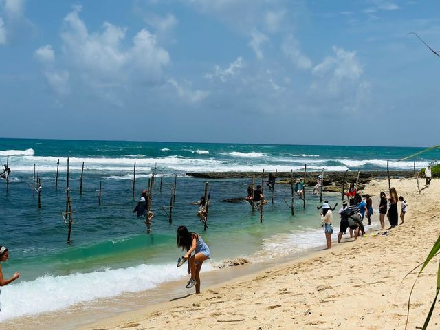Stilt Fishing in the beach.
