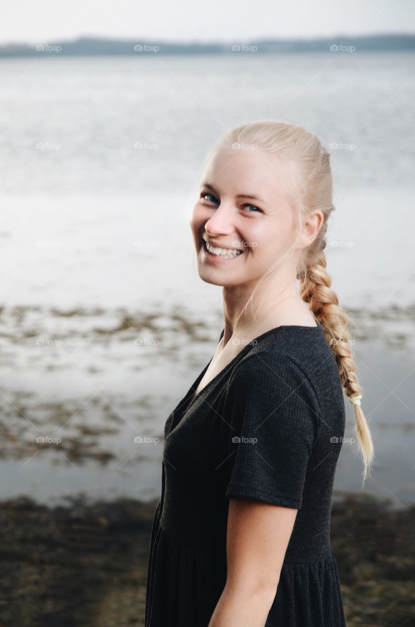 Portrait of a young woman on the beach