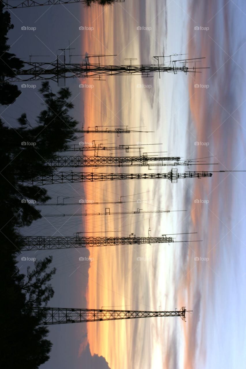 sunrise behind the communication tower