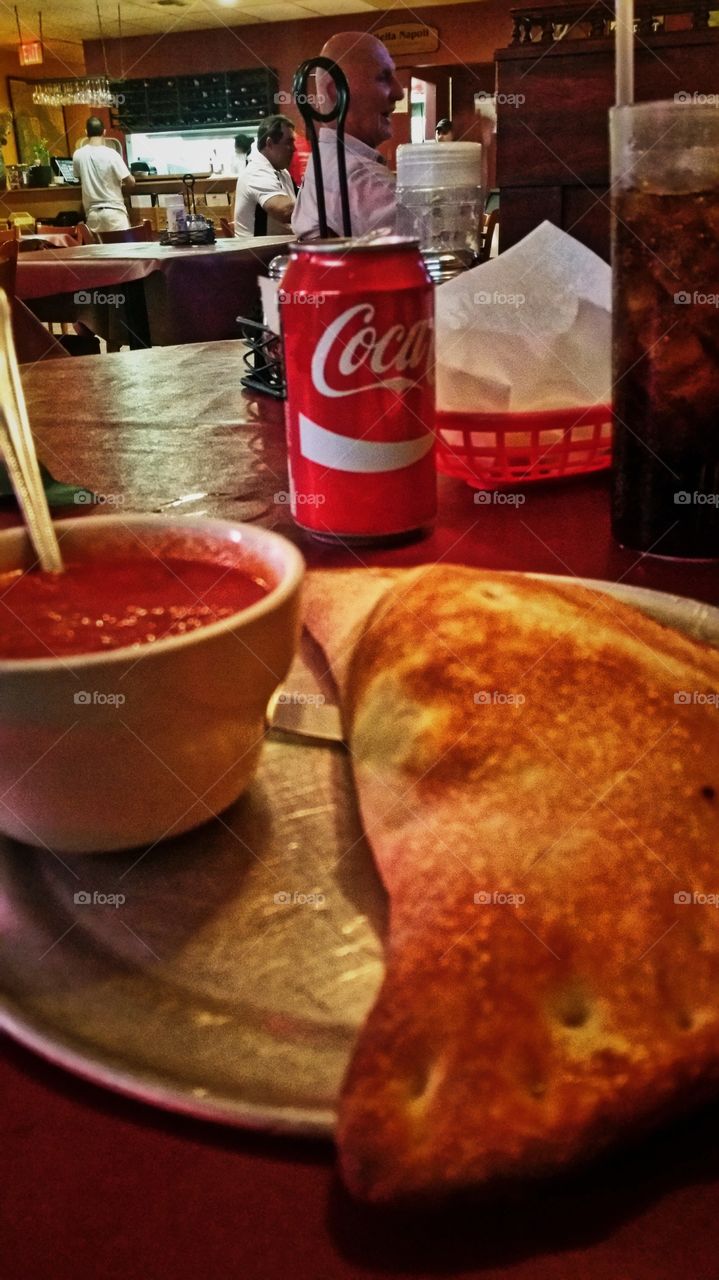 Calzone and  a coke at Italian restaurant on South Beach