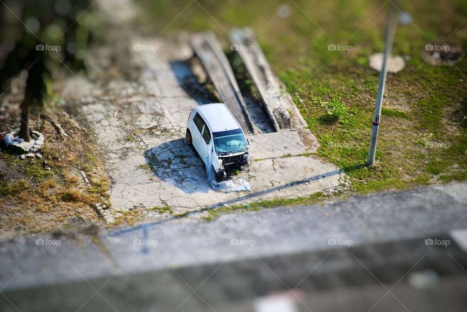 Miniature Effect of a Damaged Car