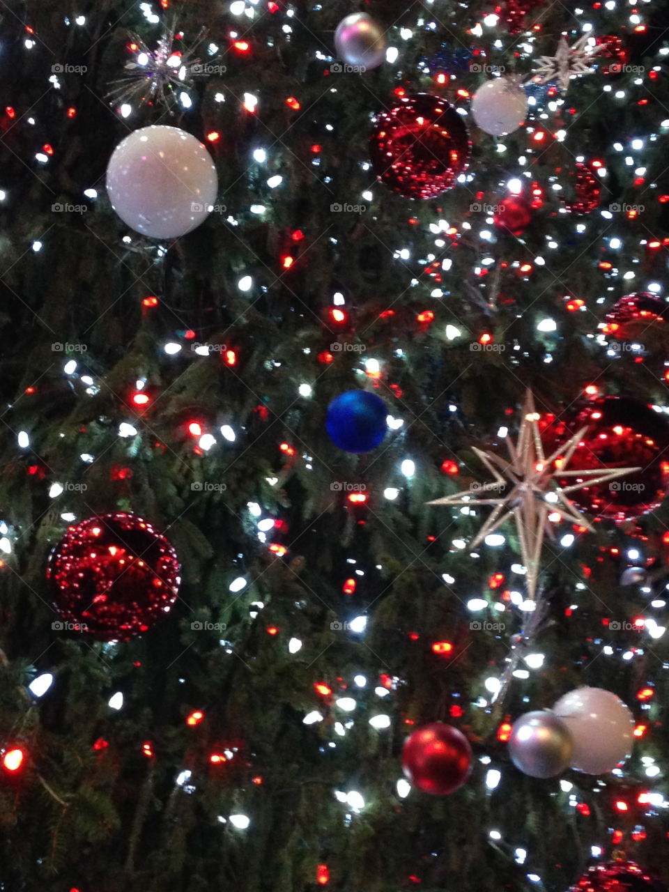 Close up of the colorful string lights and ornaments on the Rockefeller Center Christmas tree in NYC New York City. 