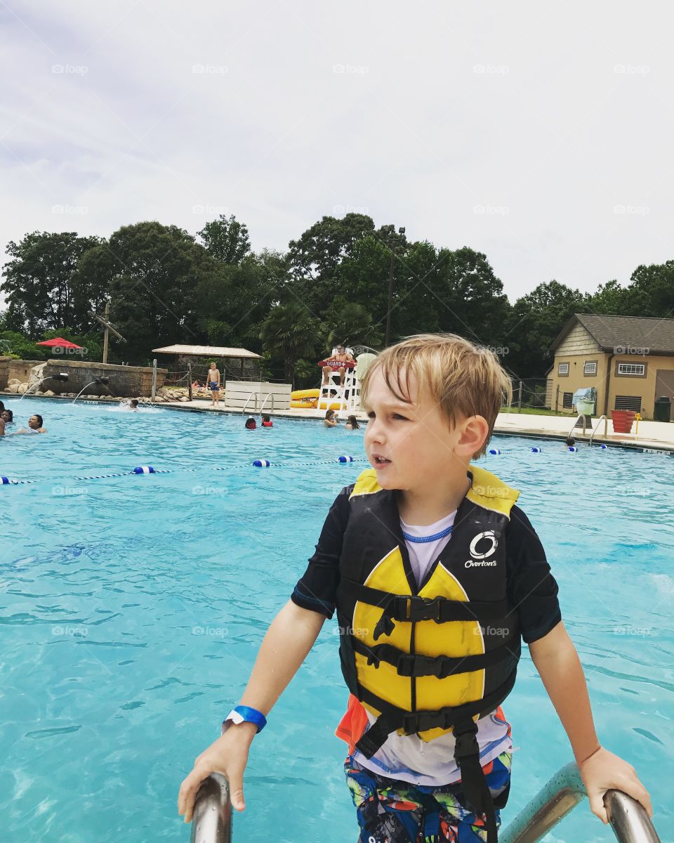 My son playing at the local water park 